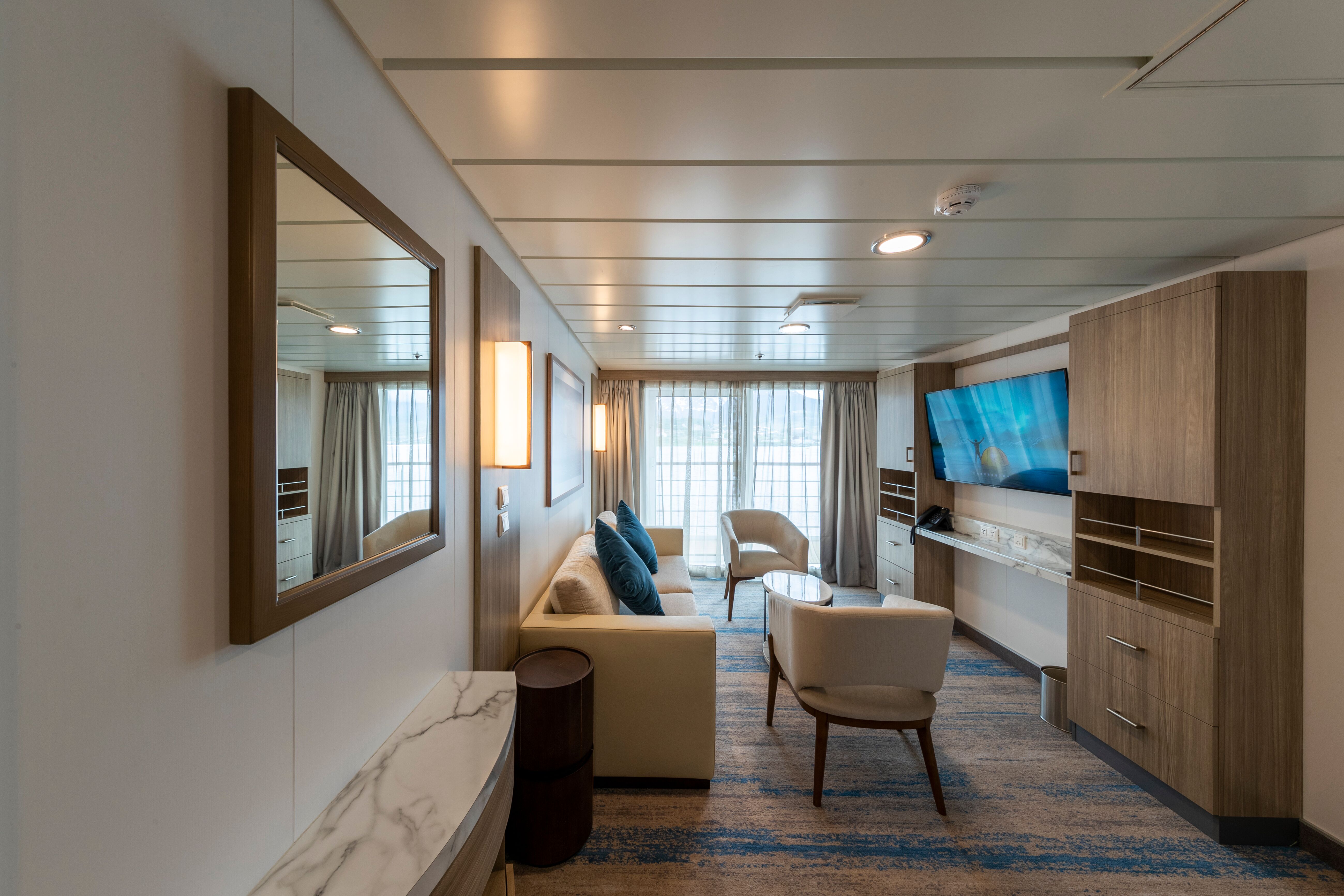 Aurora Expeditions Greg Mortimer Captains Suite Lounge.jpeg